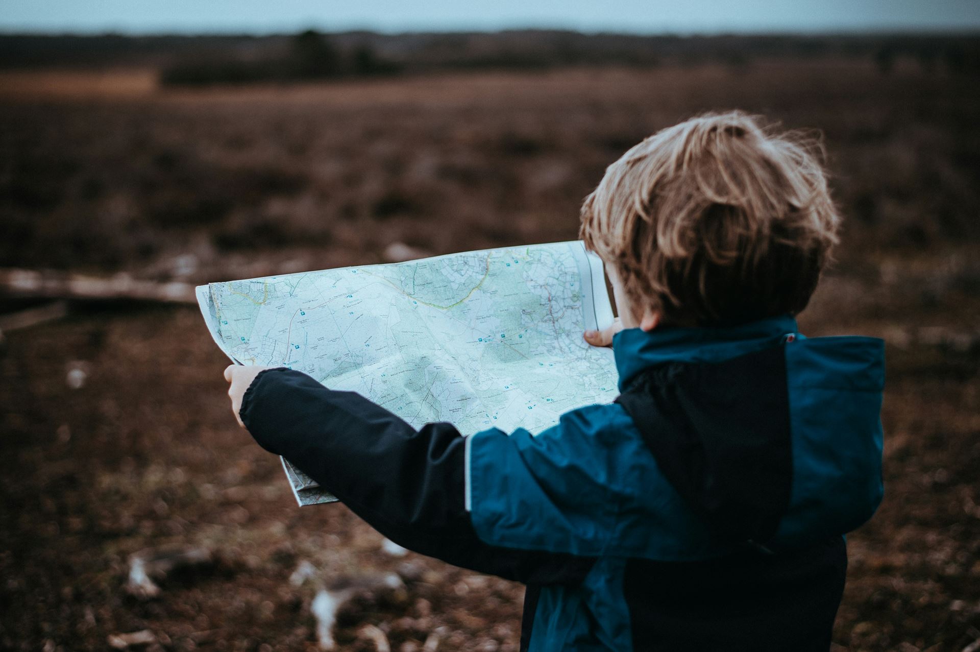 child with map